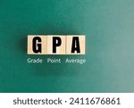 Small photo of wooden square with the letters GPA or the word grade point average
