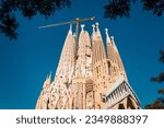 Small photo of Barcelona, Spain - 20 Aug 2023: Sagrada Familia basilica in Barcelona, Spain. The Antoni Gaudi masterpiece has become a UNESCO World Heritage Site in 1984. High resolution 61 megapixels.