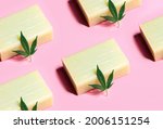 CBD Cannabidiol infused soap on pink background, concept of the use of Hemp in skin personal hygiene products