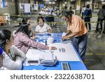 Small photo of Guatemala City, Guatemala - 06-25-23. Since early morning, voters began arriving at the polling stations to vote in the most contested elections in Guatemala's recent history of democracy.