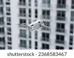 New Drone with Omnidirectional Obstacle Sensin, 4K Camera and props flying in air with cityscape behind - DJI Mini 4 Pro, Sep 29, Miami, Florida