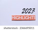 Small photo of 2023 Highlights inscription on white background. Best events of the year 2023, recap review assessment evaluation performance concept