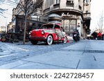 Small photo of Belgrade, Serbia - December 23, 2022: Car set on fire by an arsonist in the center of Belgrade. Burned down olditimer showpiece car in the famous street called Skadarlija in Belgrade city, Serbia