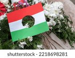 Small photo of Hungarian flag with a hole , during the Hungarian uprising against the communist authorities in 1956, the communist arms were removed from the center of their flag, leaving a hole, memorial place