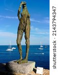 Small photo of Antibes, France - September 2021: Jaume Plensa's iconic Le Nomade sculpture and the classic works of Picasso in the Musee Picasso are on permanent display in the French Riviera resort town of Antibes.