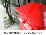 Vintage Red Post Box On Street.