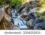 Small photo of Sapadere canyon with wooden paths and cascades of waterfalls in the Taurus mountains near Alanya, Turkey. High quality photo