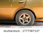 Gold Car Old  Flat Tire With...