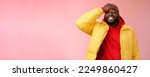 Small photo of Charming cute black bearded 25s guy forget something stupid silly smiling friendly punch forehead grinning feel awkward say sorry standing pink background joyfully relaxed. Copy space