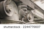 Small photo of Ancient Head Peering Betwixt Column Whirls on Ljubljanica Sluice Gate