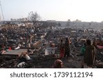 Small photo of Karachi, Pakistan - January 23, 2020: Massive fire broke out in slums located in the Teen Hatti area of Karachi