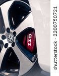 Small photo of Volkswagen Golf GTI Mk7 rims and brakes. Kyiv, Ukraine - August 2022.