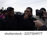 Small photo of Juarez, Mexico, 11-15-2022: migrants of different nationalities celebrate that a judge announced the end of title 42, a measure that allows the immediate expulsion of migrants who try to request asylum