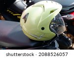 Small photo of Helmet or model, jenis dan macam helm SNI on the motorcycle. December 10, 2021, yogyakarta, Indonesia