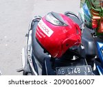 Small photo of Helmet or model, jenis dan macam helm SNI on the motorcycle. December 13, 2021, yogyakarta, Indonesia