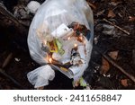 Small photo of Burn plastic waste, Indonesia, 12 January 2024 burning rubbish, plastic, inorganic, burnt, with fire, in an open area, the fire engulfs the rubbish, white smoke billows, the rubbish is completely burn