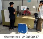 Small photo of Yia airport exit, Indonesia February 21, 2024 buy an electronic money card, YIA airport exit gate, visible high pillars and exit vehicle lane, with electronic money card system, unattended