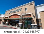 Small photo of 2024 March 19: Santa Clarita, CA. Jo-Ann, JoAnn Fabric and Crafts Store. Store front, blue sky. Angle view from right side of entrance.