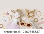 Small photo of Set of baby girl hair accessories and stuff. Ragdoll with fashion hair bows, hair clips, hairpins and hair elastics. Hairstyles for girls with stylish accessory.