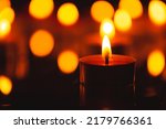 Small photo of scented candle,scented candles on old wooden background,Symbol of eternal memory, mourning, minutes of silence, memorial day. The concept of loss and to the memory