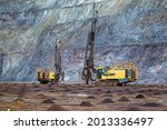 Drill Rigs On An Open Pit Money