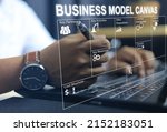 Small photo of Businessman planning a business plan with business model canvas through a laptop on the desktop for project presentation and budgeting from high net worth investors value proposition cost and revenue.