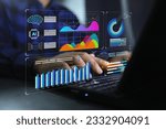 Businessman or data scientist working on laptop with business dash board analytics chart metrics KPI to analyze the performance and create insign reports of business management. Data science concept.