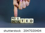 Small photo of Posted or deleted symbol. Businessman turns wooden cubes and changes the word 'deleted' to 'posted'. Beautiful grey background. Business and posted or deleted concept. Copy space.