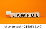 Small photo of Lawful or unlawful symbol. Turned wooden cubes and changed the concept word Unlawful to Lawful. Beautiful orange table orange background, copy space. Business and lawful or unlawful concept.