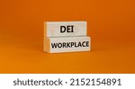 Small photo of DEI diversity equity inclusion workplace symbol. Blocks with words DEI workplace on beautiful orange background. Business DEI diversity equity inclusion workplace concept. Copy space.