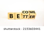 Small photo of Become better symbol. Turned wooden cubes and changed the concept word Better to Become. Beautiful white table white background. Business become better concept. Copy space.