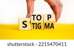 Small photo of Stop stigma symbol. Concept words Stop stigma on wooden cubes. Businessman hand. Beautiful yellow table white background. Business and Stop stigma concept. Copy space.