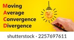 Small photo of MACD symbol. Concept words MACD moving average convergence divergence on yellow paper on beautiful yellow background. Business MACD moving average convergence divergence concept. Copy space.