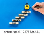 Small photo of Legacy and future symbol. Concept words Our legacy is your future on wooden blocks. Beautiful blue background. Businessman hand. Light bulb icon. Business legacy and future concept. Copy space.