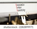 Small photo of EOQ economic order quantity symbol. Concept words EOQ economic order quantity typed on retro typewriter on a beautiful white paper background. Business EOQ economic order quantity concept. Copy space.