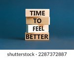 Time to feel better symbol. Concept words Time to feel better on wooden block. Beautiful grey table grey background. Motivational business time to feel better concept. Copy space