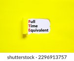 Small photo of FTE Full time equivalent symbol. Concept words FTE Full time equivalent on white paper. Beautiful yellow table yellow background. Business and FTE Full time equivalent concept. Copy space.