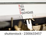 Small photo of FTE Full time equivalent symbol. Concept words FTE Full time equivalent typed on beautiful retro old typewriter. Beautiful white background. Business and FTE Full time equivalent concept. Copy space.