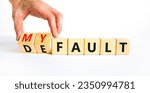 Small photo of Default is my fault symbol. Concept words Default and My fault on wooden cubes. Beautiful white table white background. Businessman hand. Business default is my fault concept. Copy space.