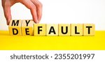 Small photo of Default is my fault symbol. Concept words Default and My fault on wooden cubes. Beautiful yellow table white background. Businessman hand. Business default is my fault concept. Copy space.