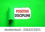 Small photo of Positive discipline symbol. Concept words Positive discipline on beautiful white paper. Beautiful green paper background. Business psychology positive discipline concept. Copy space.