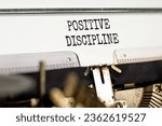 Small photo of Positive discipline symbol. Concept words Positive discipline typed on beautiful old retro typewriter. Beautiful white paper background. Business psychology positive discipline concept. Copy space.