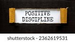 Small photo of Positive discipline symbol. Concept words Positive discipline on beautiful white paper. Beautiful black paper background. Business psychology positive discipline concept. Copy space.