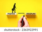 Small photo of Positive discipline symbol. Concept words Positive discipline on beautiful wooden blocks. Beautiful yellow background. Businessman hand. Business psychology positive discipline concept. Copy space.