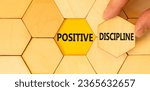 Small photo of Positive discipline symbol. Concept words Positive discipline on beautiful wooden puzzles. Beautiful yellow paper background. Business psychology positive discipline concept. Copy space.