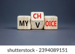 Small photo of My voice choice symbol. Businessman turns wooden cubes and changes the concept word My choice to My voice. Beautiful grey table grey background, copy space. Business and my voice choice concept