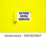 Small photo of Rethink revise rebrand symbol. Concept word Rethink Revise Rebrand on beautiful white paper. Beautiful yellow table background. Business brand motivational rethink revise rebrand concept. Copy space.