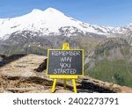 Small photo of Remember why you started symbol. Concept word Remember why you started on beautiful black chalk blackboard. Beautiful mountain lake background. Business remember why you started concept. Copy space.
