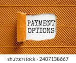 Small photo of Payment options symbol. Concept words Payment options on beautiful white paper. Beautiful brown background. Business payment options concept. Copy space.