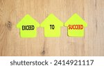 Small photo of Exceed to succeed symbol. Concept words Exceed to succeed on beautiful yellow paper houses. Beautiful wooden table wooden background. Business and exceed to succeed concept. Copy space.